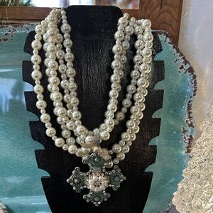 Triple-Strand Pearl Necklace with Green Gemstone Pendant